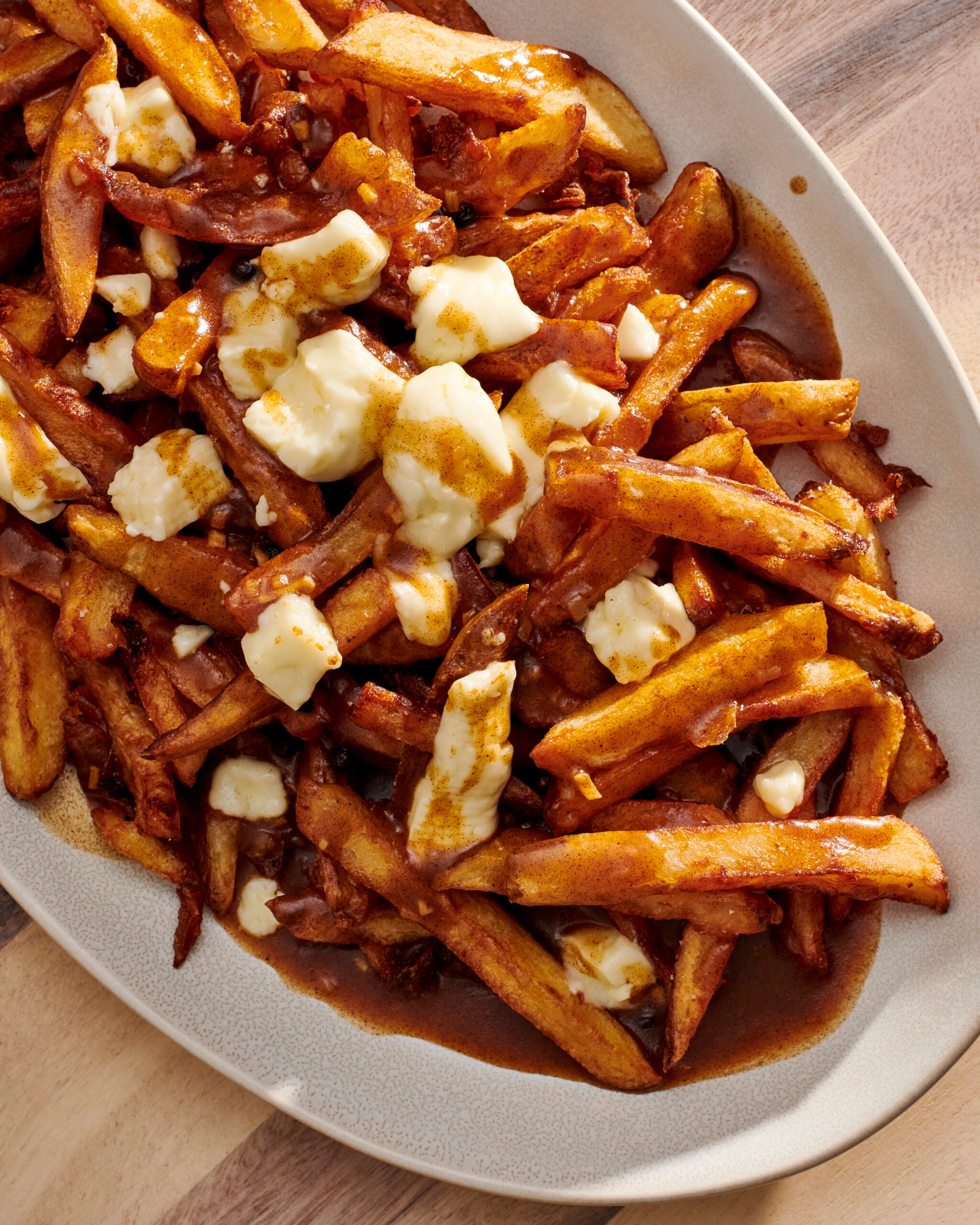 La Nascita Accogliente della Poutine 🇨🇦
